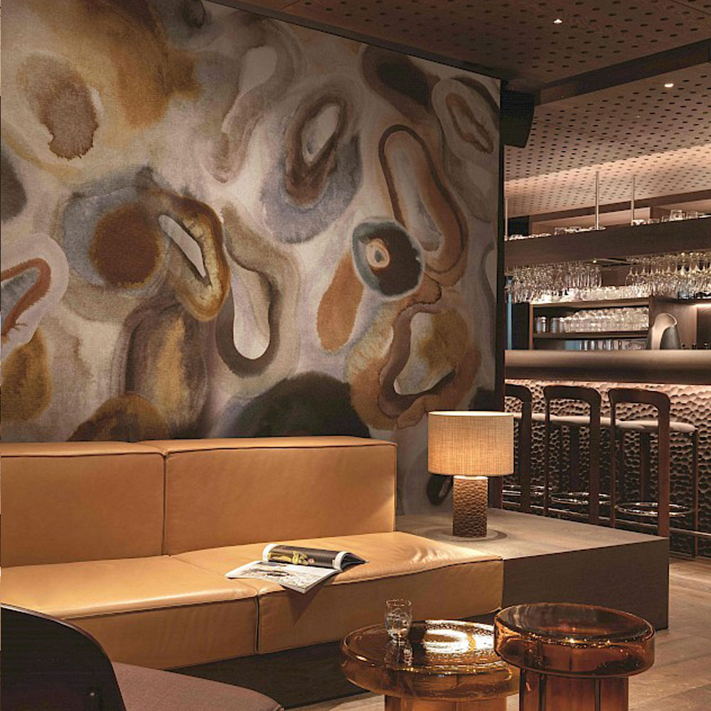 Erosion Wall Mural installed in a restaurant with large organic painted shapes design
