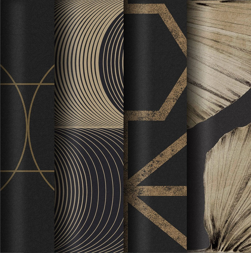 Close up of 4 rolls of Black and Gold Wallpaper with geometric and organic patterns