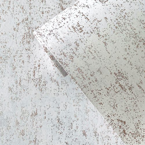 Close up of the detail of the embossed texture in the Mineral Plaster Wallpaper - Metallic Rose Gold