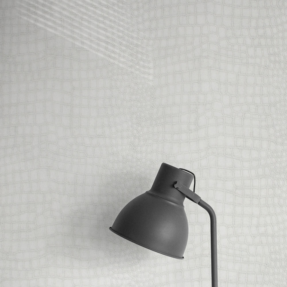 Close up[ of a retro lamp casting a shadow on the Crocodile Wallpaper White on a wall