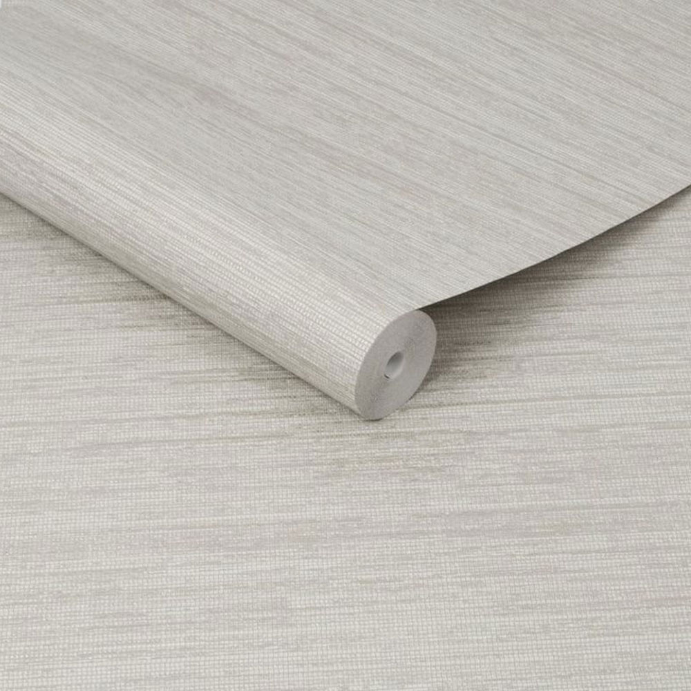 Roll of pearl beige grey metallic silver wallpaper showing deep grasscloth texture