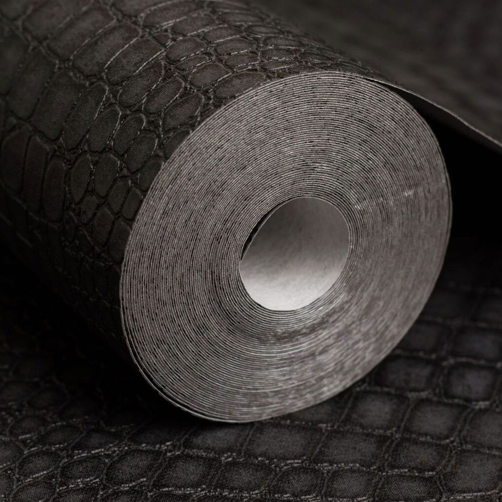 Close up of the roll of Black Crocodile Wallpaper showing the crocodile texture