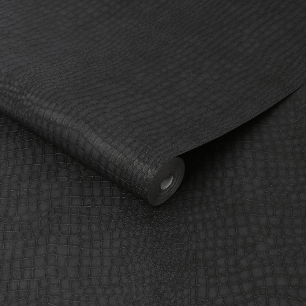 Slightly unrolled roll of Crocodile Wallpaper in Black