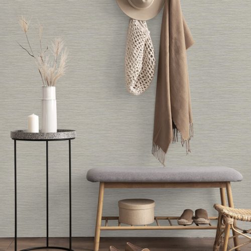 Entrance hall with Deeply Textured Grasscloth Wallpaper Beige installed on the wasll. Also shows small bench, coat hooks with coat and hat plus small table and vase