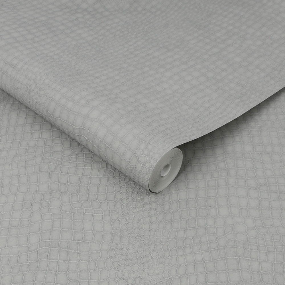 Roll of Grey Crocodile Wallpaper slightly unrolled
