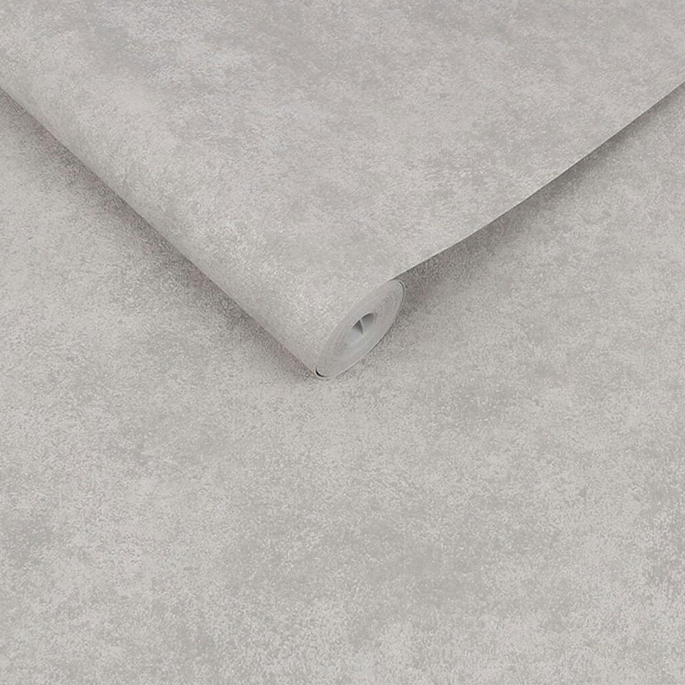 Roll of light grey pearl faux plaster metallic wallpaper highlighting the pearl texture, slightly unrolled