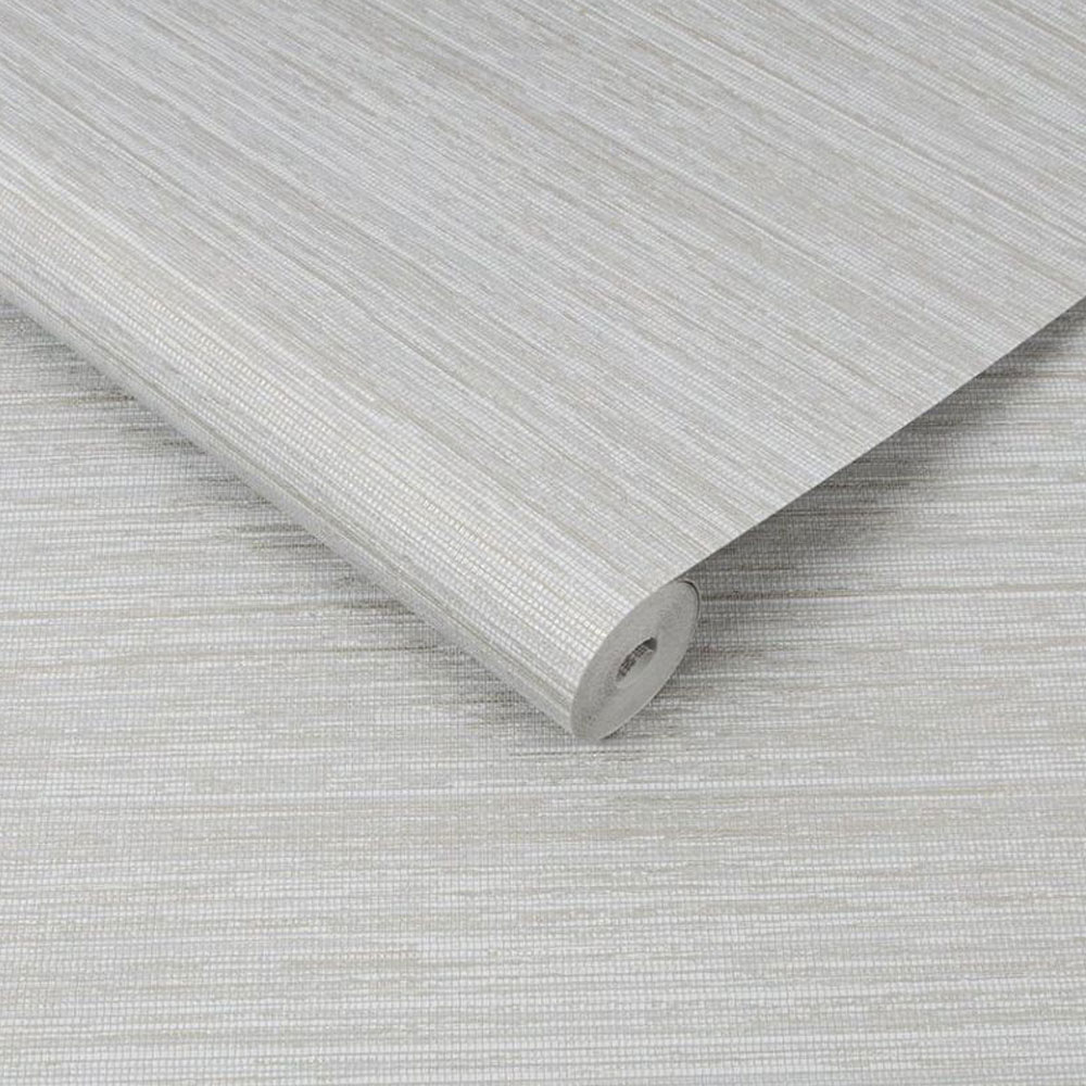 Roll of light grey grasscloth textured wallpaper with metallic highlights. sightly unrolled