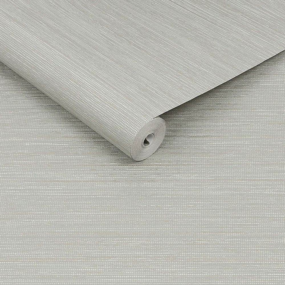 Roll of sage textured faux grasscloth wallpaper slightly unrolled
