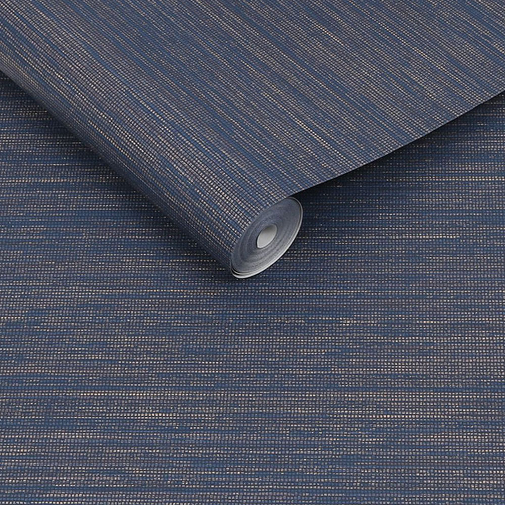 Roll of sapphire blue faux grasscloth wallpaper with gold silver metallic accents