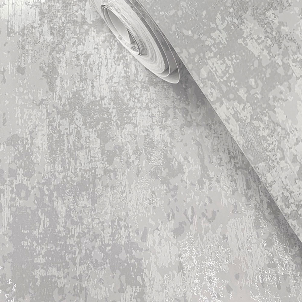 Zoomed in roll of the printed chalk weather plaster look wallpaper in grey and silver