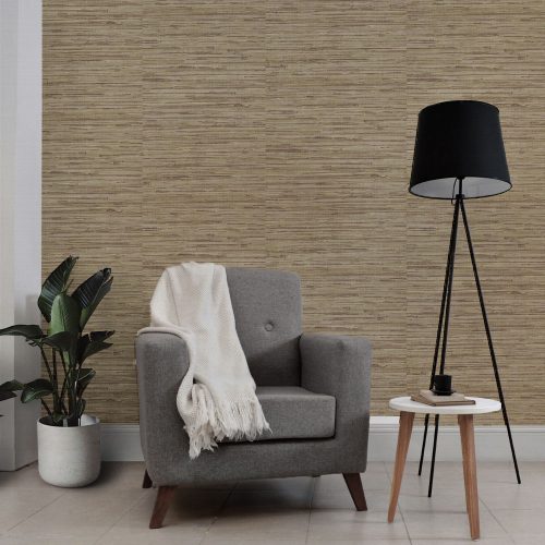 Lounge with woven grasscloth weallpaper golden taupe installed on the wall. Also features arm chair with thrown, black standing lamp, side table and leafy pot plant